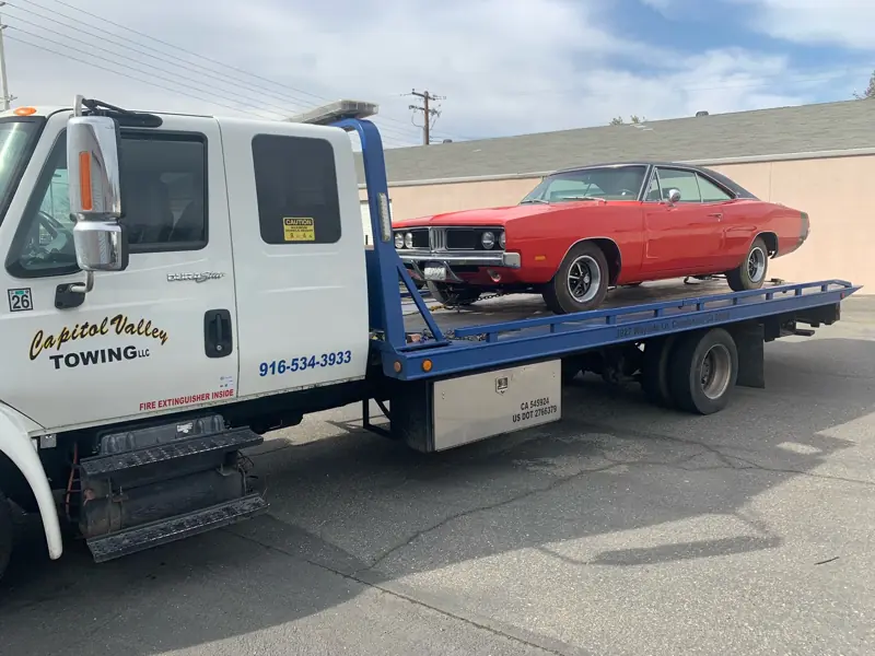 Classic orange Charger on a flatbed
