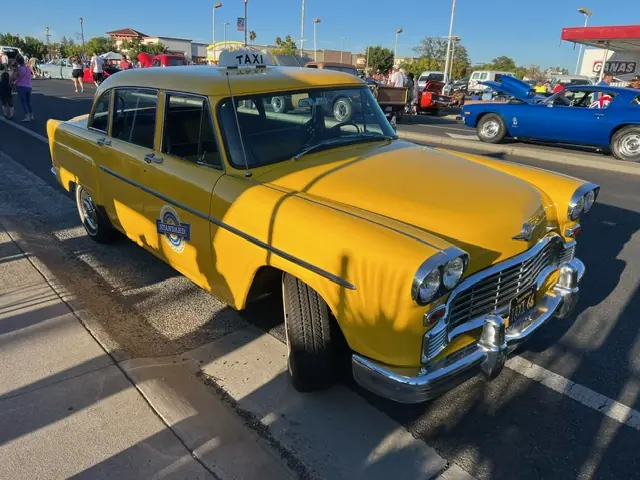 Yellow Checker cab at a car show