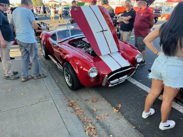 Red and white Shelby Cobra at a car show
